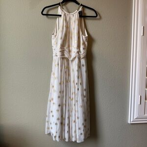 white and gold halter dress
